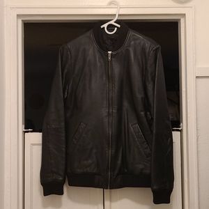 Black leather bomber jacket in mint condition